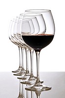 red wine glass and empty glasses