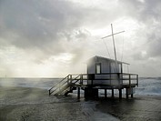 Lifeguard house in bad weather and strong waves, Sylt, Germany