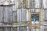 Facade with windows and wooden planks in a house Taüll - Valle de Boi - Pyrenees - Lleida Province - Catalonia - Cataluña - Spain