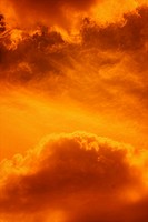 Clouds cumulonimbus, in striking orange colour