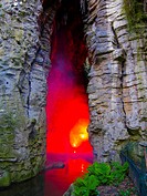 Paris, France, Red Light inside Cave in Urban Park, Buttes Chaumont