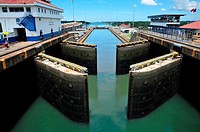 Panama Canal locks filling with water for ships passage, Panama