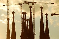 The Sagrada Familia towers and their cranes at dusk in Barcelona, Catalonia, Spain