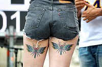 Dancer with butterfly tattoos on their thighs, Gay Pride Day 2011, Madrid, Spain