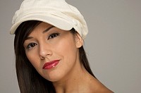 Latin woman topless looking at camera with red lipstick