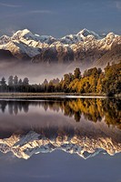 Lake Matheson dawn reflection, Mt Tasman left and Aoraki / Mt Cook, near Fox Glacier, Westland National Park, West Coast of South Island, New Zealand