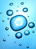 Water droplets with recycle symbols isolated on a blue background
