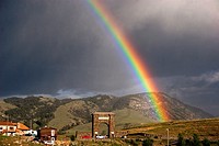 Rainbow and Roosevelt Arch at North Entrance Yellowstone National Park USA