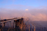 Fog at dawn over the Severn Bridge from the English end at Aust, Gloucestershire, England, United Kingdom