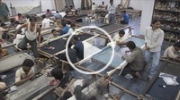 Time_Lapse of the workshop of an embroidery company as it fills with workers in Mumbai, Maharashtra, India