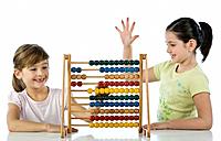 Girls using abacus
