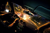 view of the inside of a car. Driving in the night
