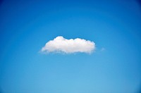 Single cumulus cloud in the sky