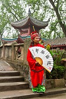 A dynasty warrior in ethnic dress welcomes guests to the city of Ghosts in Fengdu, China, Asia