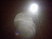 Streetlamp and snowfall