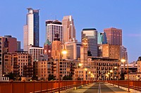 Minneapolis skyline at dawn as seen from the Stone Arch Bridge   The Stone Arch Bridge is a former railroad bridge crossing the Mississippi River at S...