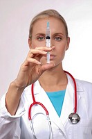 Doctor using a syringe, isolated on white