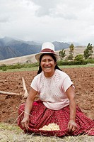 Peruvian Lady in a Top Hat,showing the corn that she was planting  Chinchero,Peru