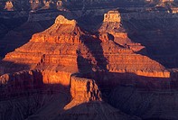 Sandstone buttes redden at sunset, from Hopi Point, South Rim, Grand Canyon National Park, Arizona, USA