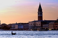 Europe, Italy, Veneto, Venice, a gondola on the Grand Canale facing the Doge´s Palace, at sunset