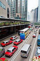 Peak hour traffic on Connaught Rd, a main highway through downtown Hong Kong  This street used to be along the waterfront, but land reclamation has no...