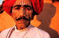 Folk dancer before performing the Kachhi ghodi dance. From Rajasthan, India. The Kachhi ghodi dance can be translated in the horse dance in english. T...