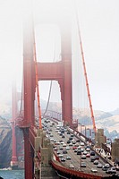 Traffic and fog on the Golden Gate Bridge, San Francisco, California, USA