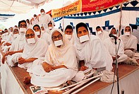 Jaïn nuns meeting in Rajasthan, India. This photo has been taken at a time when jain monks were giving a public religious lecture to the lay persons. ...