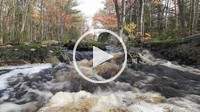 water flowing in a small stream in the Adirondack mountains in New York state USA in autumn