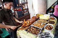 Traditional food on offer during a baptism party at a filipino family house  Lapu-Lapu City, Metro Cebu, Mactan Island, Visayas, Philippines