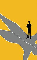 Man standing on a road in the shape of a woman