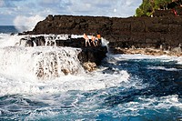 Queens Bath is located in Princeville on Kauai, Hawaii, USA. A trail down the cliff takes you to volcanic rocks and the tumultuous ocean. Locals cliff...