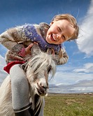 Girl with goat, Goat farm, Iceland