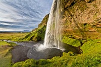 Seljalandsfoss Waterfall, Iceland This waterfall drops 60 metres 200 ft over the cliffs  There is a trail behind for easy access to walk behind the fa...