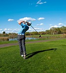 A golfer hits his drive off the first tee at Granite Bay Golf Club