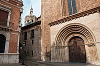 View Romanesque door of the cathedral of Valencia and Miguelete tower.