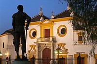 La Maestranza bullring and statue of bullfigther Pepe Luis Vazquez, Seville, Region of Andalusia, Spain, Europe