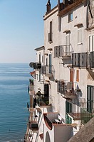 Italy, Latina, Sperlonga  Homes squeezed together on cliff facing out to the Tyrrhenian Sea
