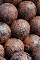 Rusty cannon balls stacked at Castillo San Felipe del Morro, San Juan National Historic Site, a national park in Old San Juan, Puerto Rico