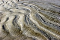 Low Tide is sand ripples on Crescent Beach in Florida. USA