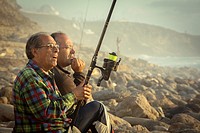 Two friends fishing in Ericeira