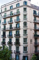 Facade of building in the Eixample of Barcelona, Avda Diagonal, 366, constructed in 1936 It has the 5th floor with arched windows, unlike the others f...