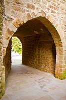 Dark street of Su  Popular style, thirteenth century   Small medieval street, covered with a vault  It has two arches, one input street semicircular s...