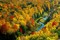 The Porcupine Mountains State Park and the Ontonagon River with fall foliage color from the Lake of the Clouds overlook near Ontonagon, Michigan, USA