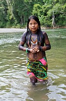 little girl bathing at the river, Embera native community living by the Chagres River within the Chagres National Park, Republic of Panama, Central Am...