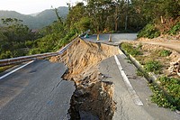 Landslide damage caused by typhoons and torrential rains on a mountain road in Okinawa.