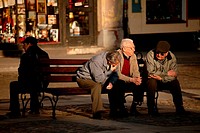Three old men talking