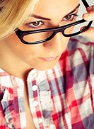 Blond young woman with glasses. Color.