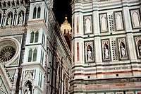 The Duomo and Belltower area at night in Florence Italy.