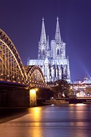 Cologne Cathedral with River Rhine and Hohenzollern Brucke (Bridge), Cologne, Rhine-Westphalia, Germany.